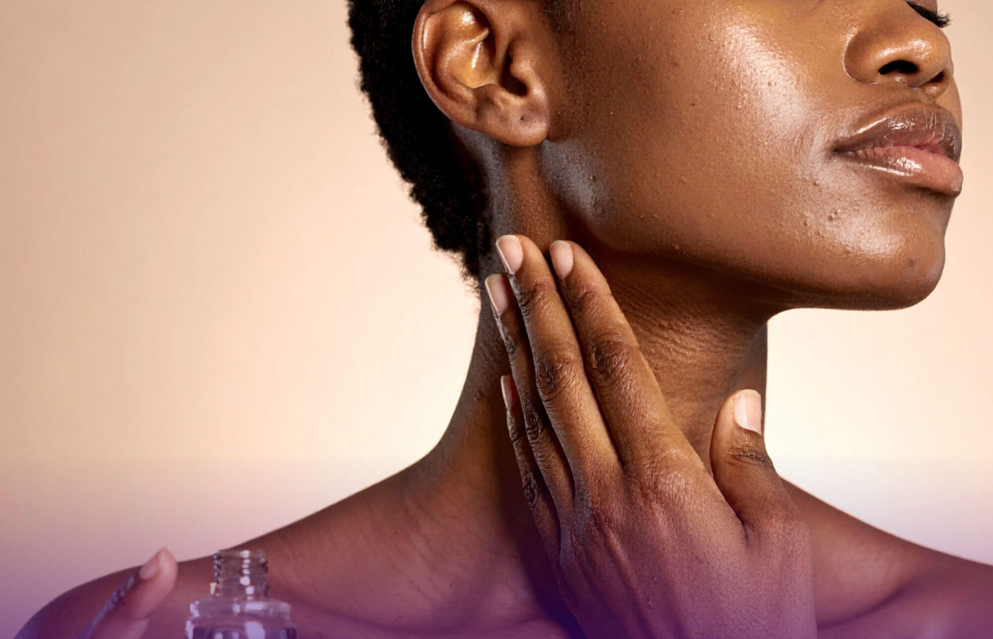 Women applying cream to face - blog image